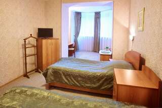 Гостевой дом Мини-отель «Малахит 2000» Екатеринбург Односпальная кровать в общем номере-2